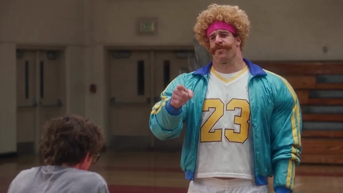 Mr. Gonner in the gym in front of his new class.
